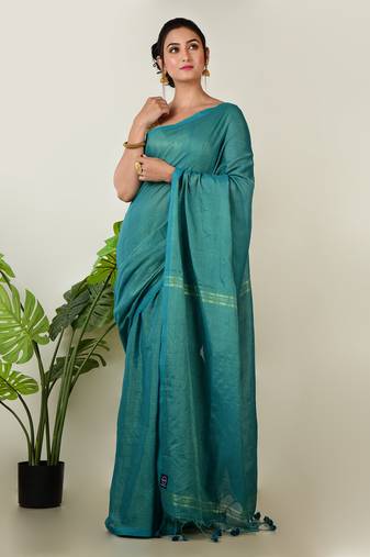 Aakar turquoise green handloom linen saree with golden zari stripe