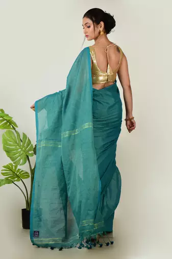Aakar turquoise green handloom linen saree with golden zari stripe