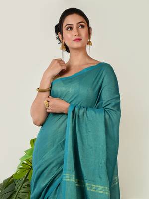 Aakar turquoise green handloom linen saree with golden zari stripe 5