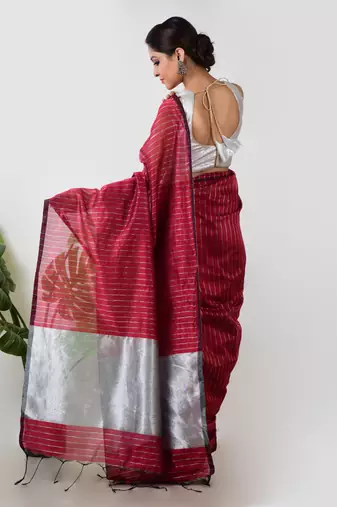 Aakar red handloom linen saree with white zari stripe