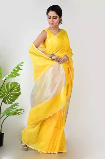 Aakar yellow handloom linen saree with white zari stripe