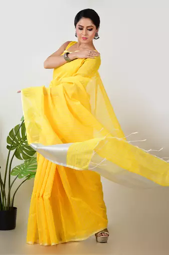 Aakar yellow handloom linen saree with white zari stripe