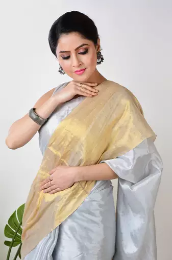 white and yellow handloom tissue saree