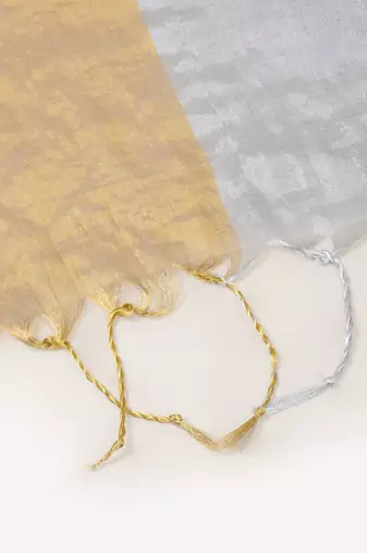 white and yellow handloom tissue saree