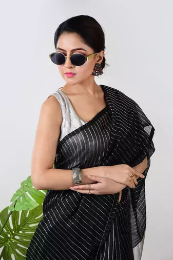 Aakar black handloom linen saree with white zari stripe