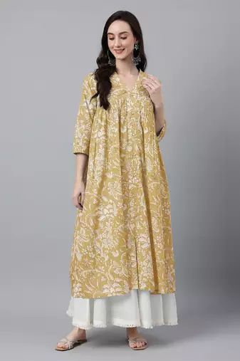 Janasya women's mustard pure cotton floral printed flared kurta