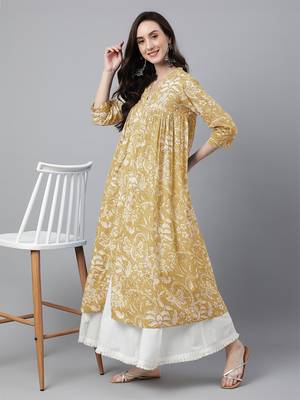 Janasya women's mustard pure cotton floral printed flared kurta 2