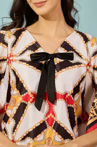 black satin kaftan crop top with exquisite baroque patterns