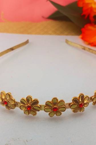 Stone stud gold plated  hair band color golden material brass  size free size