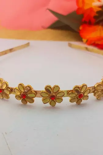 Stone stud gold plated  hair band color golden material brass  size free size