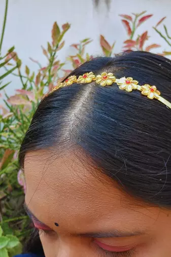Stone stud gold plated  hair band color golden material brass  size free size