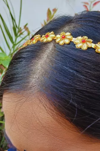 Stone stud gold plated  hair band color golden material brass  size free size