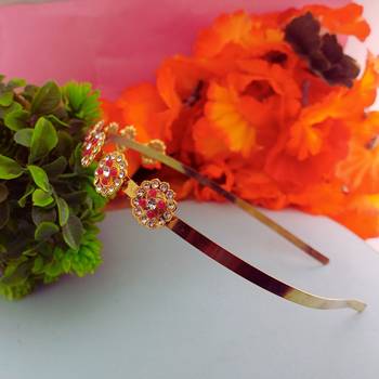Stone stud gold plated  hair band color golden material brass  size free size 2