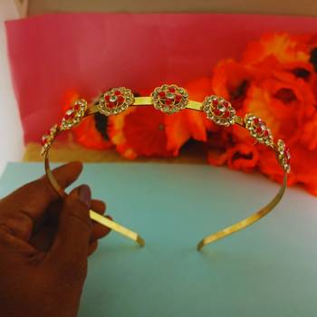 Stone stud gold plated  hair band color golden material brass  size free size 3