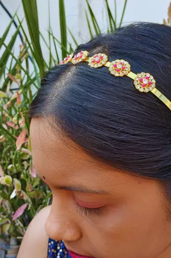 Stone stud gold plated  hair band color golden material brass  size free size