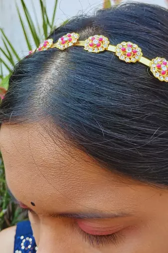 Stone stud gold plated  hair band color golden material brass  size free size