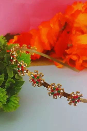 Stone stud gold plated  hair band color golden material brass  size free size