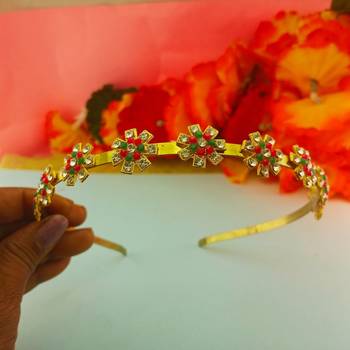 Stone stud gold plated  hair band color golden material brass  size free size 3