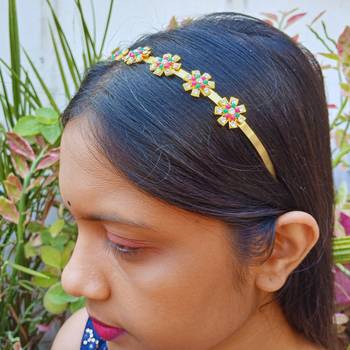 Stone stud gold plated  hair band color golden material brass  size free size 4