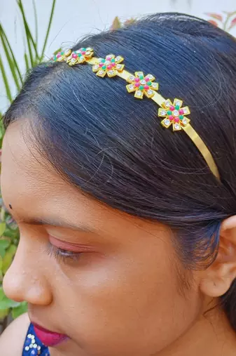 Stone stud gold plated  hair band color golden material brass  size free size