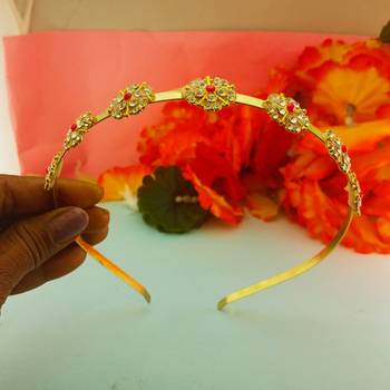 Stone stud gold plated  hair band color golden material brass  size free size 3