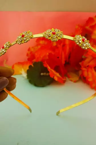 Stone stud gold plated  hair band color golden material brass  size free size