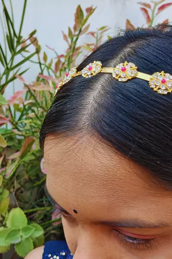 Stone stud gold plated  hair band color golden material brass  size free size