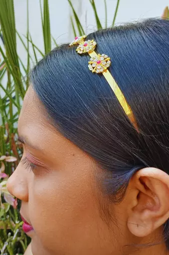 Stone stud gold plated  hair band color golden material brass  size free size