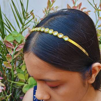 Stone stud gold plated  hair band color golden material brass  size free size 4