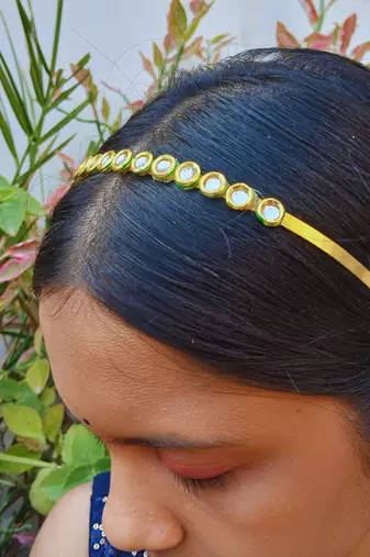 Stone stud gold plated  hair band color golden material brass  size free size