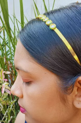 Stone stud gold plated  hair band color golden material brass  size free size