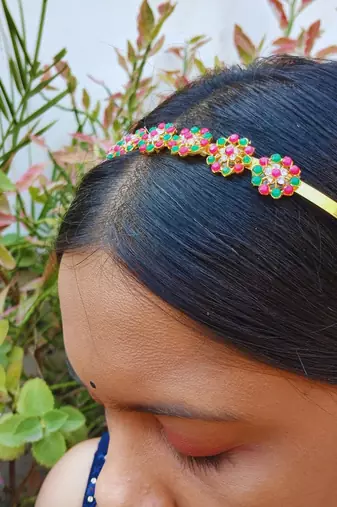 Stone stud gold plated  hair band color golden material brass  size free size