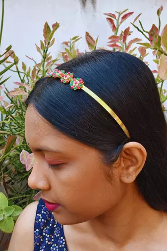 Stone stud gold plated  hair band color golden material brass  size free size
