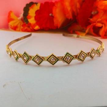 Stone stud gold plated  hair band color golden material brass  size free size 1