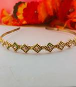 Stone stud gold plated  hair band color golden material brass  size free size