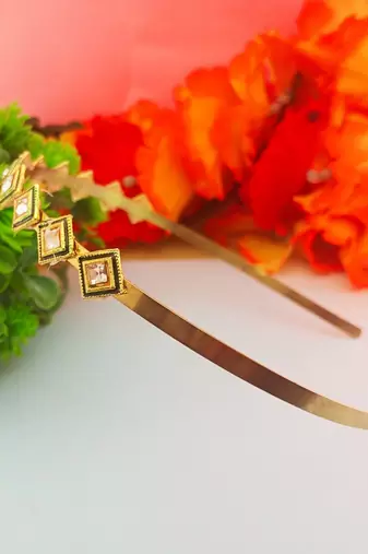Stone stud gold plated  hair band color golden material brass  size free size