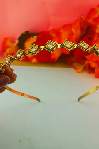 Stone stud gold plated  hair band color golden material brass  size free size