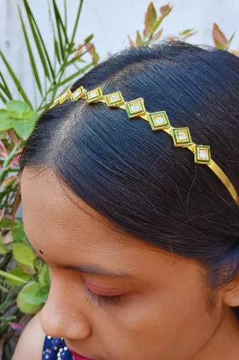 Stone stud gold plated  hair band color golden material brass  size free size
