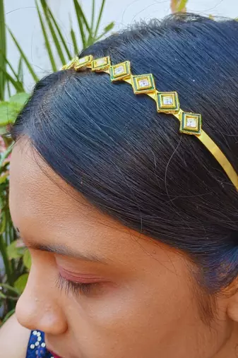 Stone stud gold plated  hair band color golden material brass  size free size