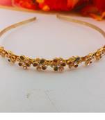 Stone stud gold plated  hair band color golden material brass  size free size