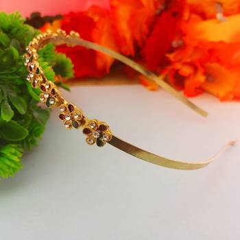 Stone stud gold plated  hair band color golden material brass  size free size 2