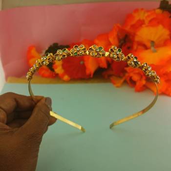 Stone stud gold plated  hair band color golden material brass  size free size 3