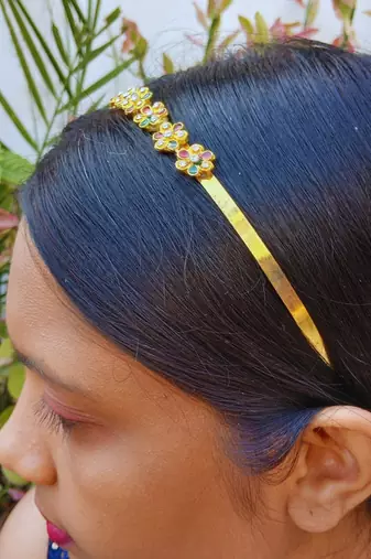 Stone stud gold plated  hair band color golden material brass  size free size