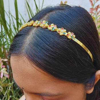 Stone stud gold plated  hair band color golden material brass  size free size 5