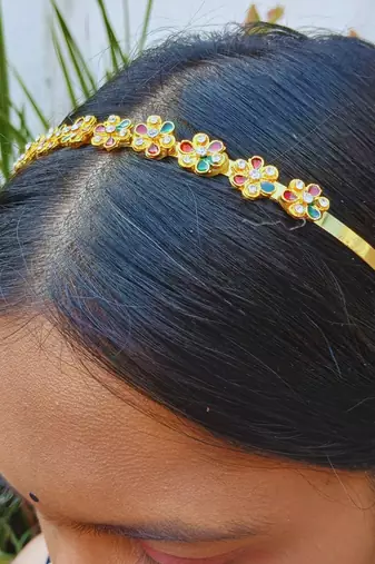 Stone stud gold plated  hair band color golden material brass  size free size