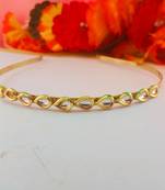 Stone stud gold plated  hair band color golden material brass  size free size