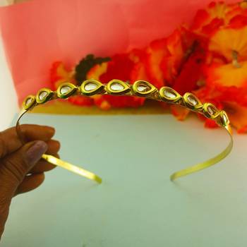 Stone stud gold plated  hair band color golden material brass  size free size 3