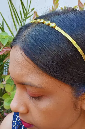 Stone stud gold plated  hair band color golden material brass  size free size