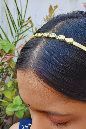 Stone stud gold plated  hair band color golden material brass  size free size