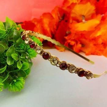 Stone stud gold plated  hair band color golden material brass  size free size 2